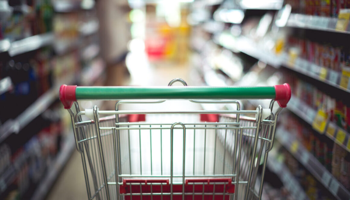 Closeup detail of a woman shopping in a supermarket